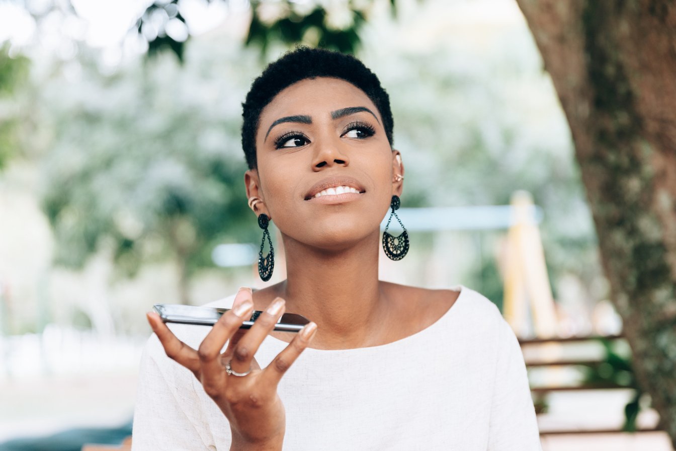 Black business woman talking on smartphone